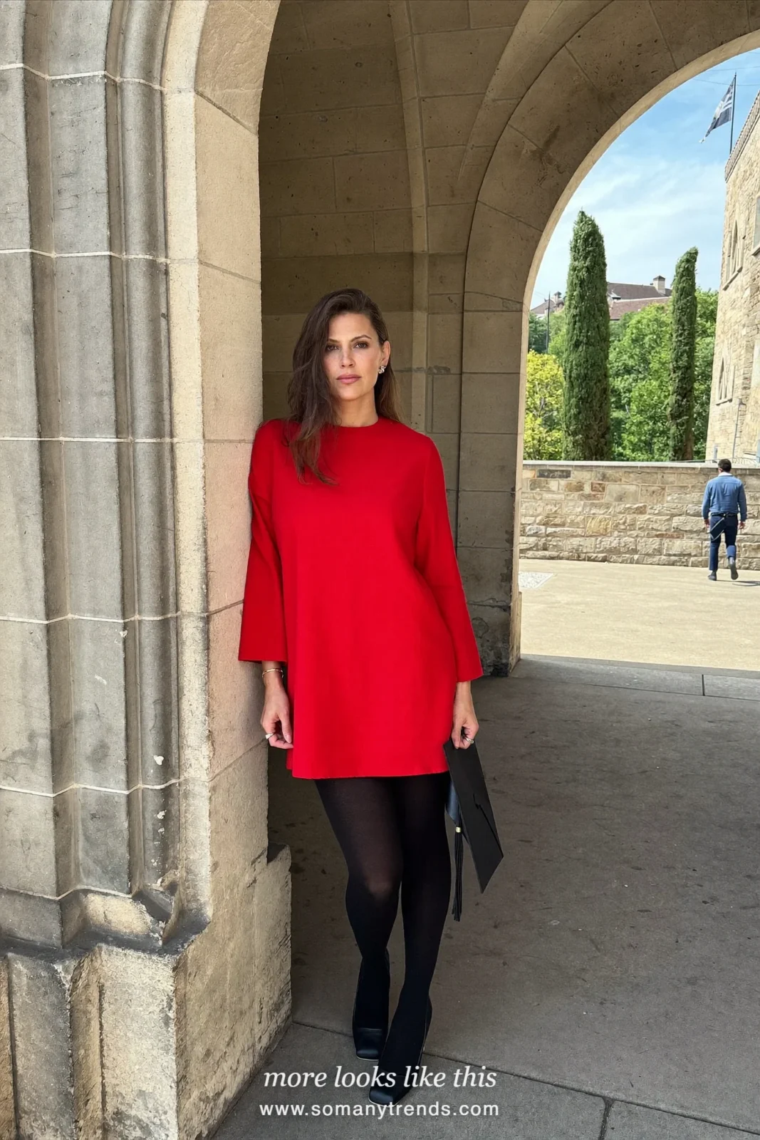 Woman wearing a long-sleeve red crew-neck knee-length dress, black opaque tights and black rounded-toe block-heel pumps, winter graduation outfit 10