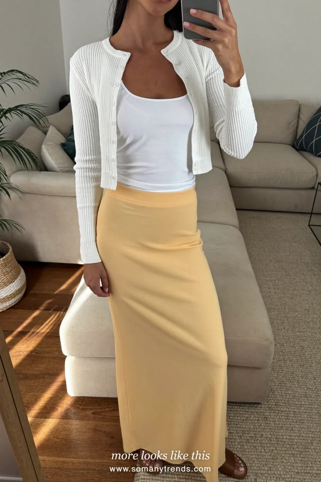 Butter yellow long column skirt with white tank, white ribbed cardigan and tan sandals, outfit 20