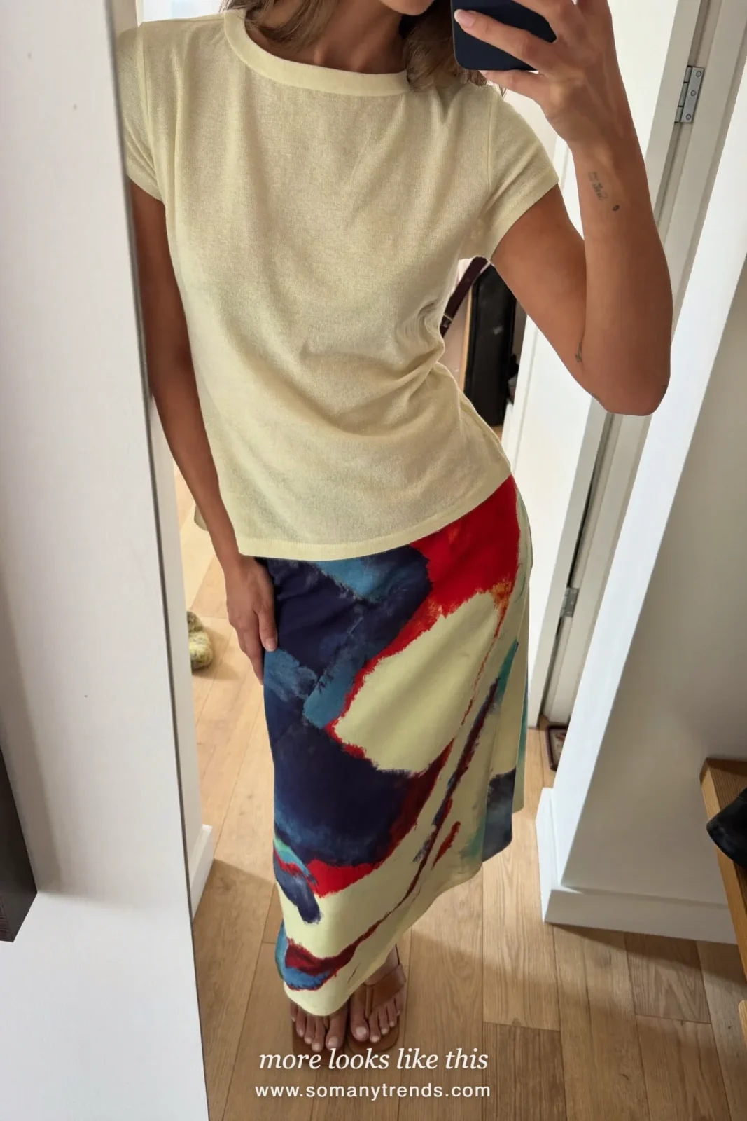 Painterly print midi skirt with cream fine knit top and tan sandals, outfit 24