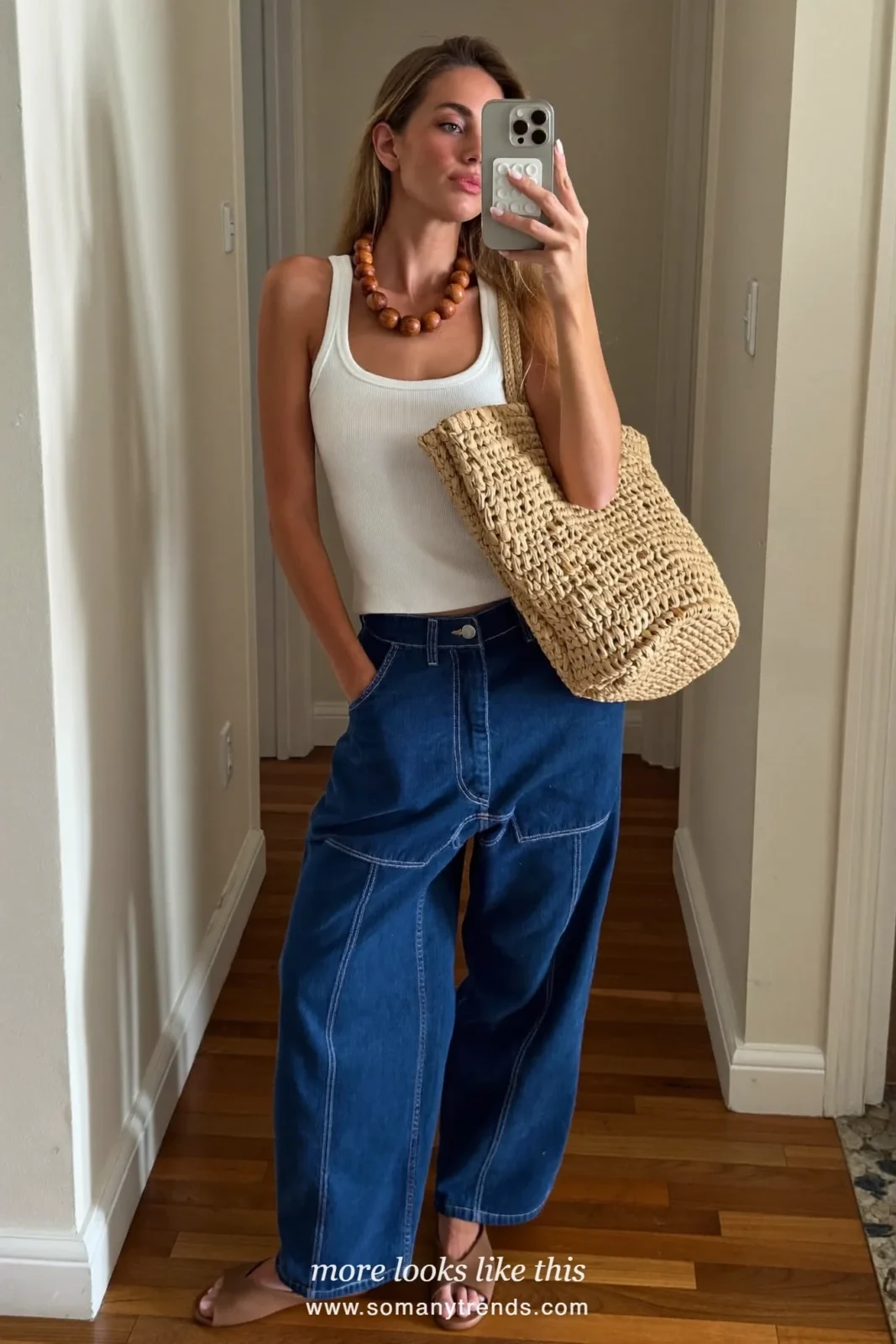Look 4: white tank, blue wide-leg carpenter pants, beaded necklace and flat sandals, mirror selfie at home