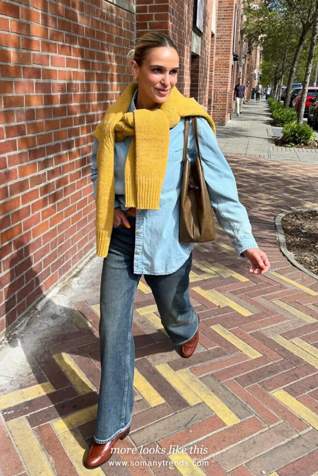 Look 6: light denim shirt, dark straight jeans, butter yellow sweater over the shoulders and brown loafers