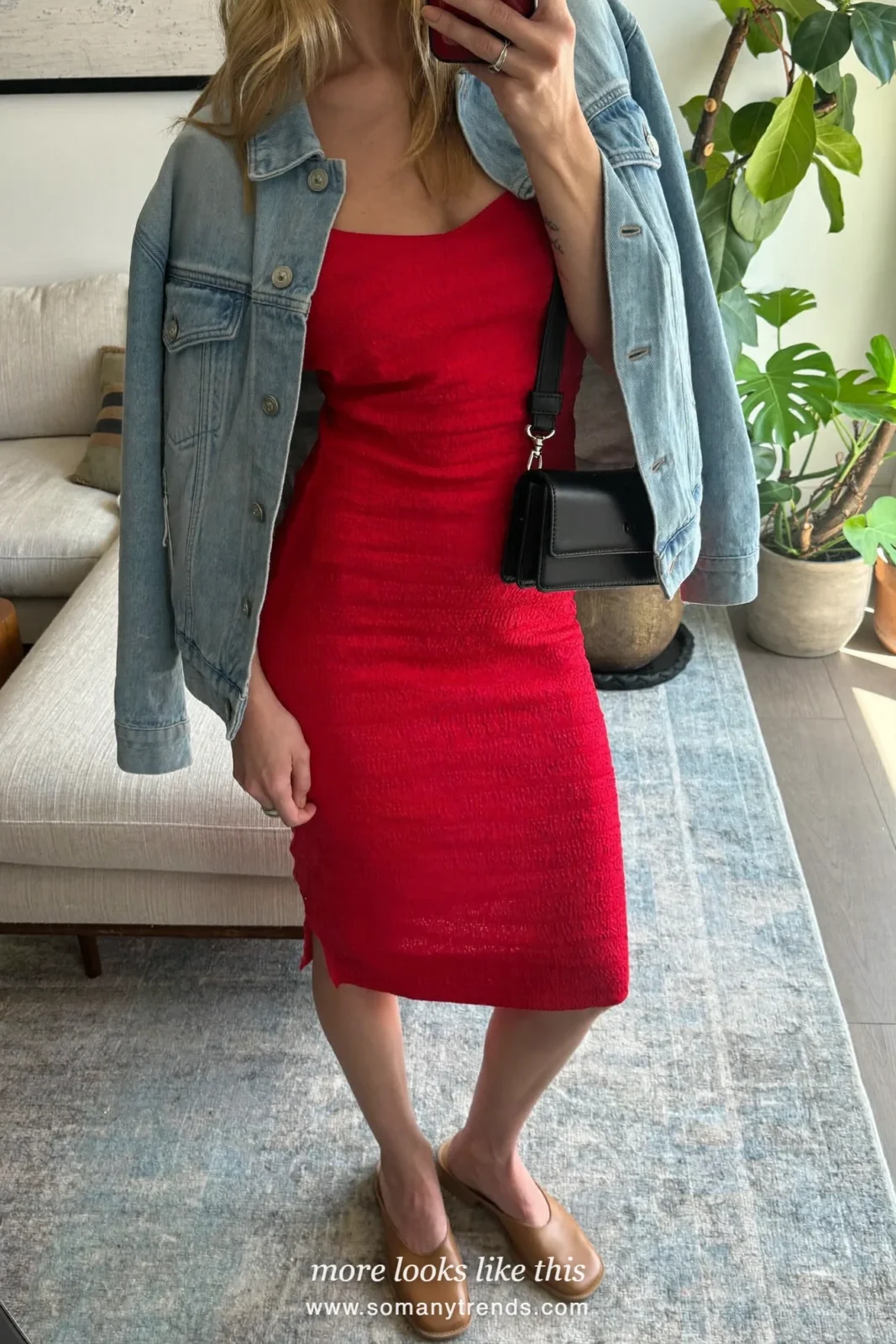 Look 16: red crepe slip dress, light denim jacket and tan flat mules, mirror selfie at home