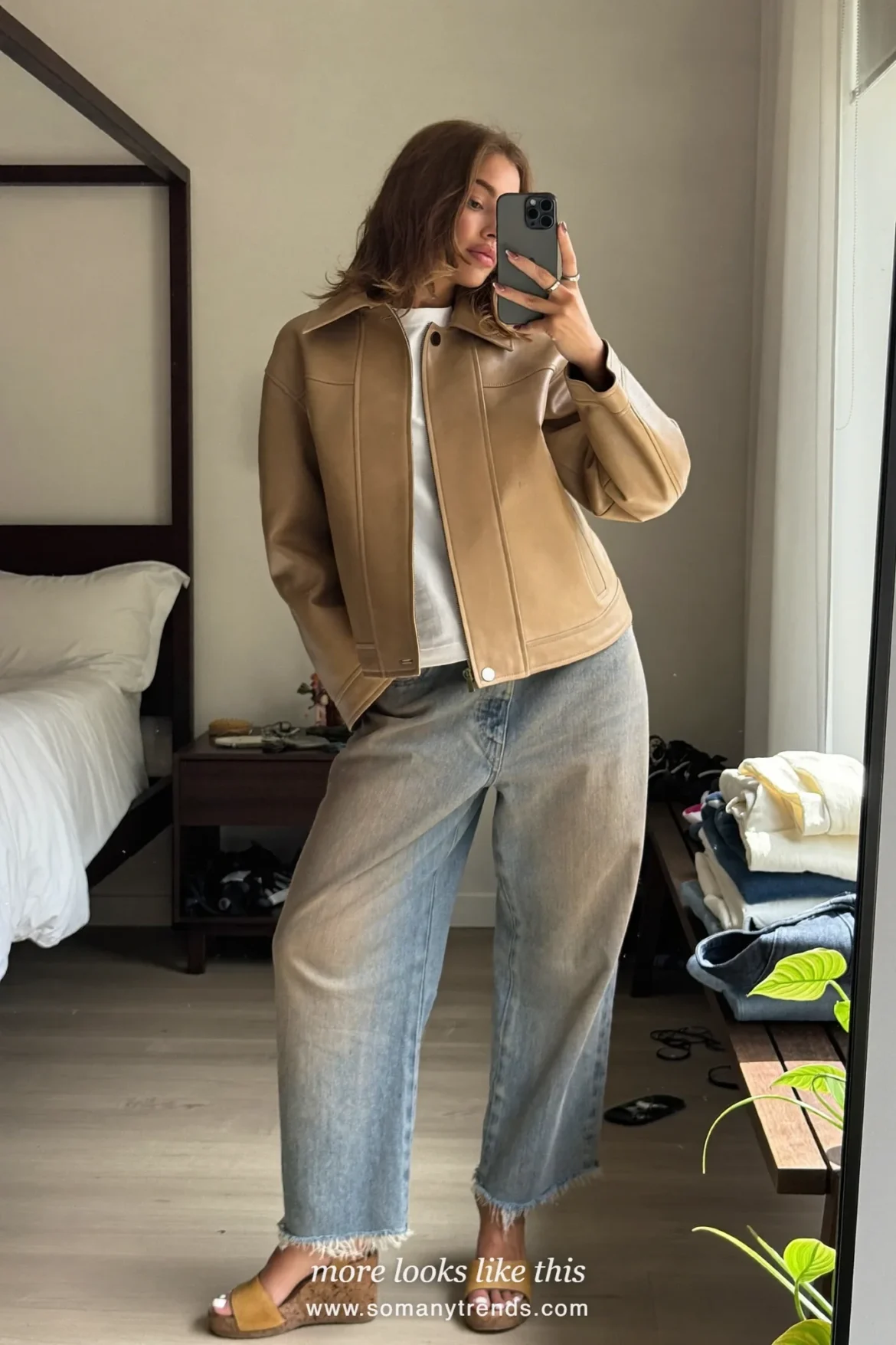 Look 20: tan faux leather jacket, white tee, light wide-leg jeans and tan wedge sandals, mirror selfie at home