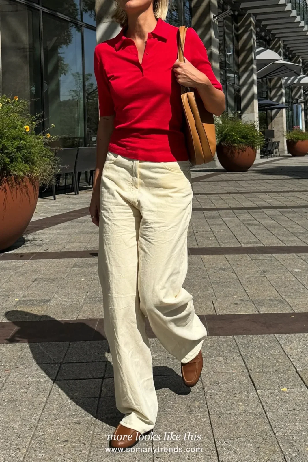 Look 23: red short-sleeve knit polo, cream wide-leg pants and brown loafers