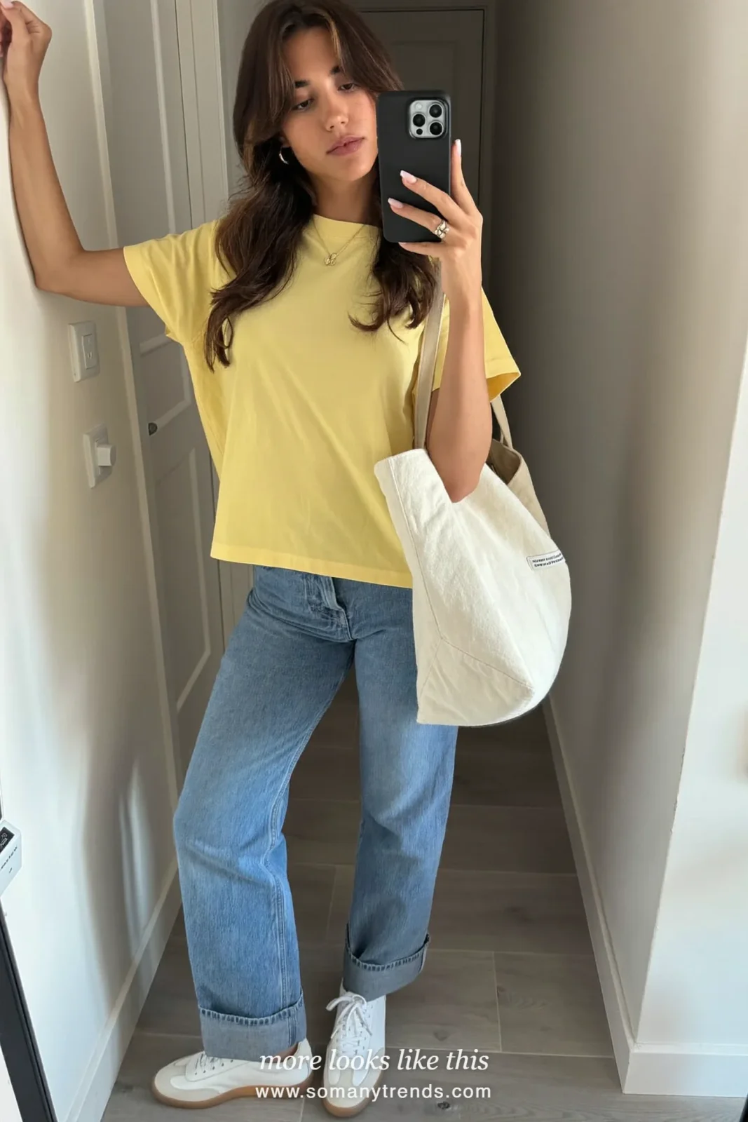 Look 24: butter yellow boxy tee, mid-wash barrel jeans and white sneakers, mirror selfie at home
