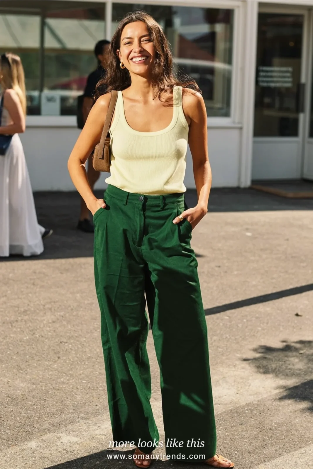 Look 22: ivory ribbed knit tank, forest green wide-leg pants and tan pointed flat sandals