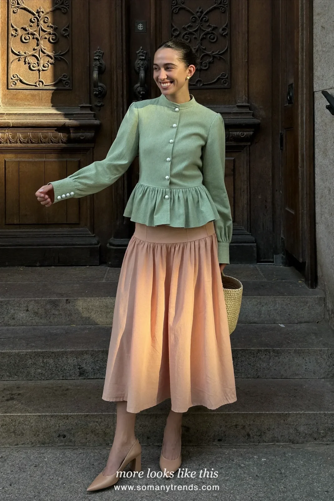 Woman in a mint peplum top, peach midi skirt and nude block heels, Easter outfit 1