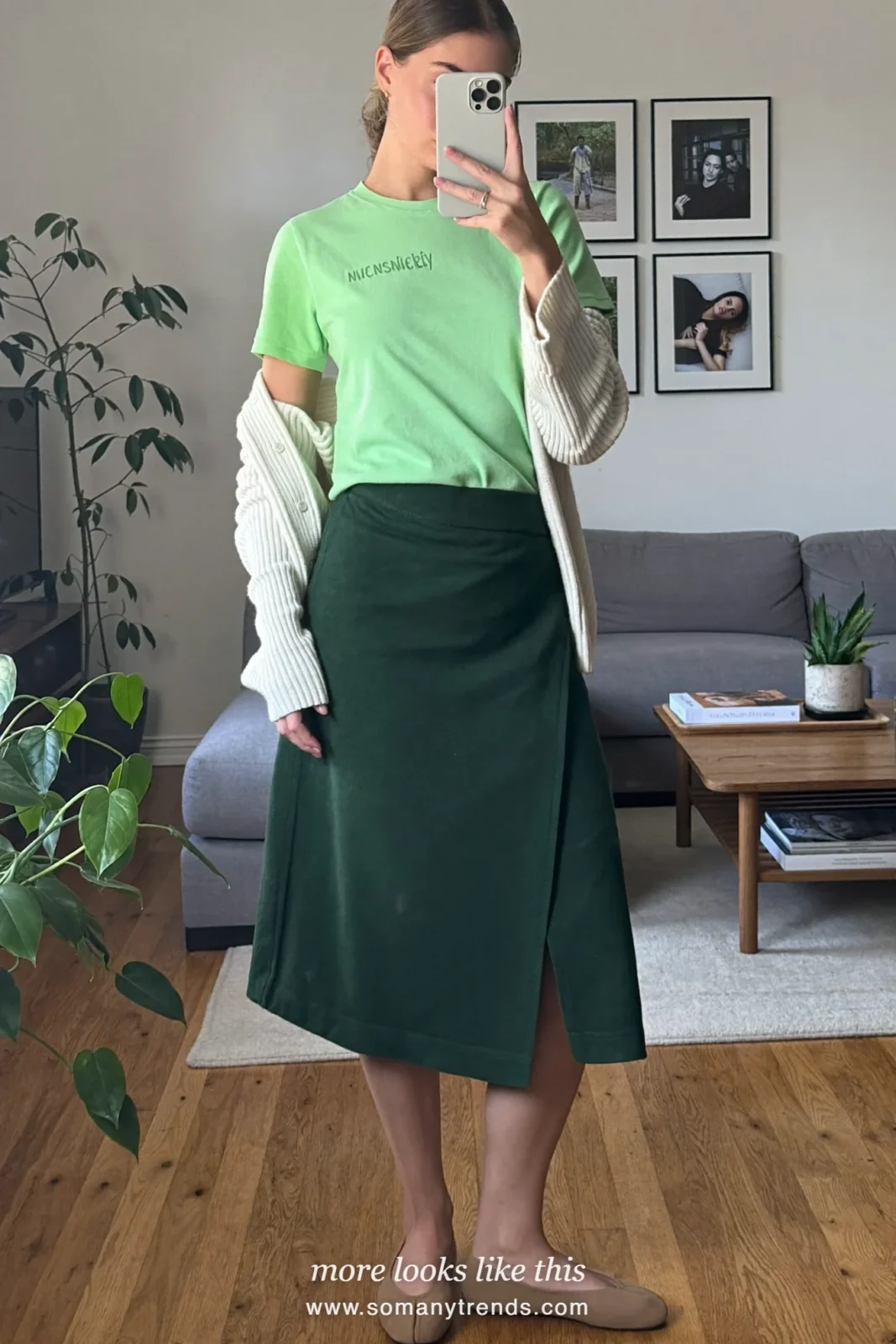 Woman at home in a mint tee, forest green wrap midi skirt and cream cardigan, mirror selfie, Easter outfit 12