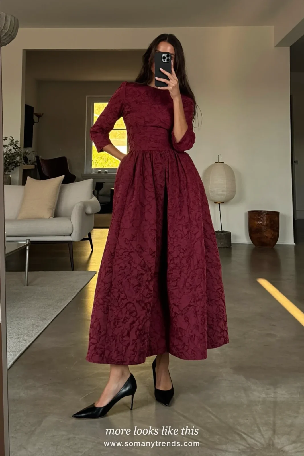 Woman in a wine jacquard midi dress with three-quarter sleeves and kitten heels at a church, wedding guest outfit 20