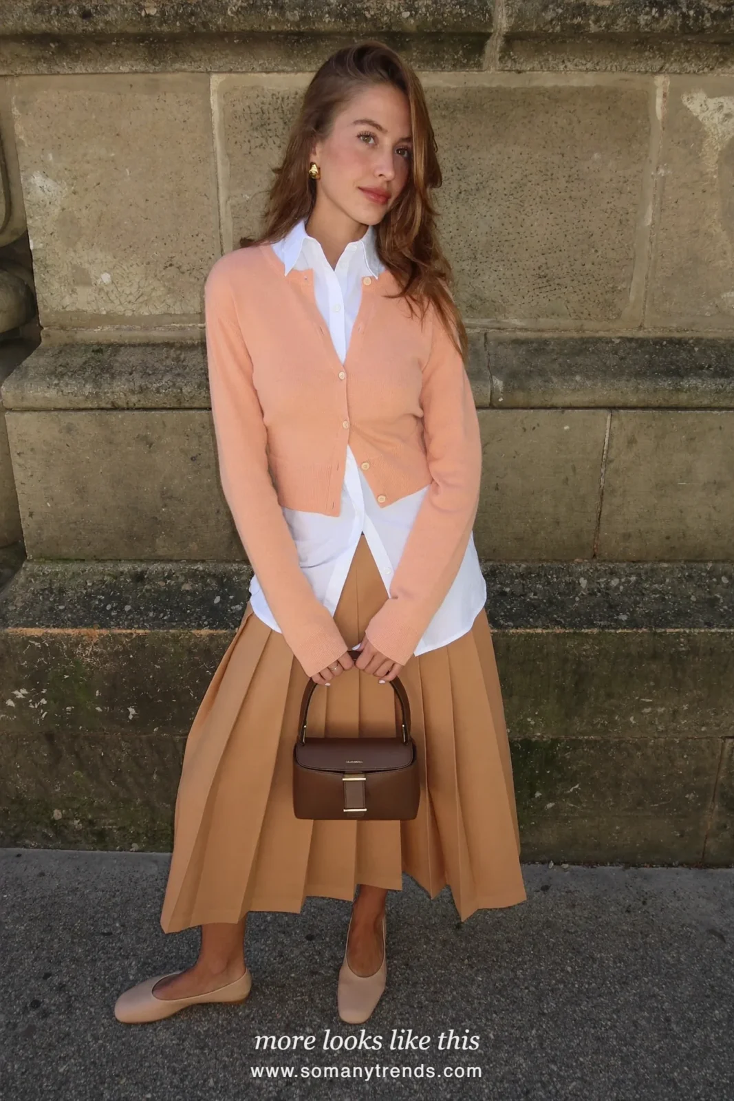 Woman in a peach cardigan, white shirt, tan pleated midi skirt and ballet flats, Easter outfit 25