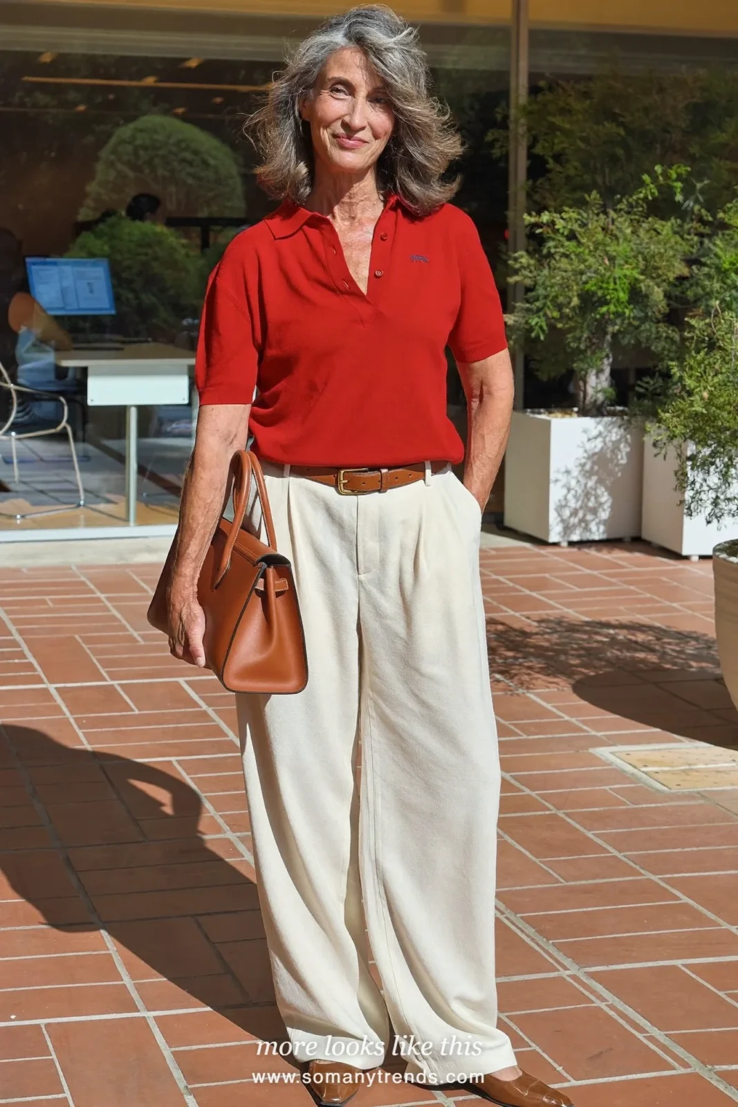 Look 11: deep red knit polo, ivory wide-leg pants, tan belt and tan pointed flats