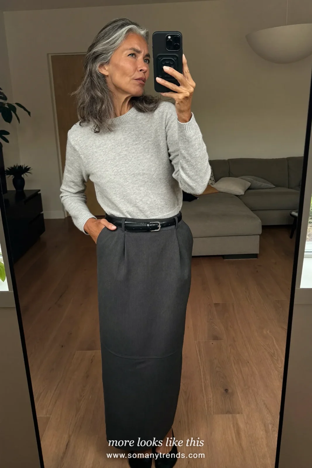 Look 12: charcoal ankle-length column skirt, pale gray fine knit, black belt and black ankle-strap flats