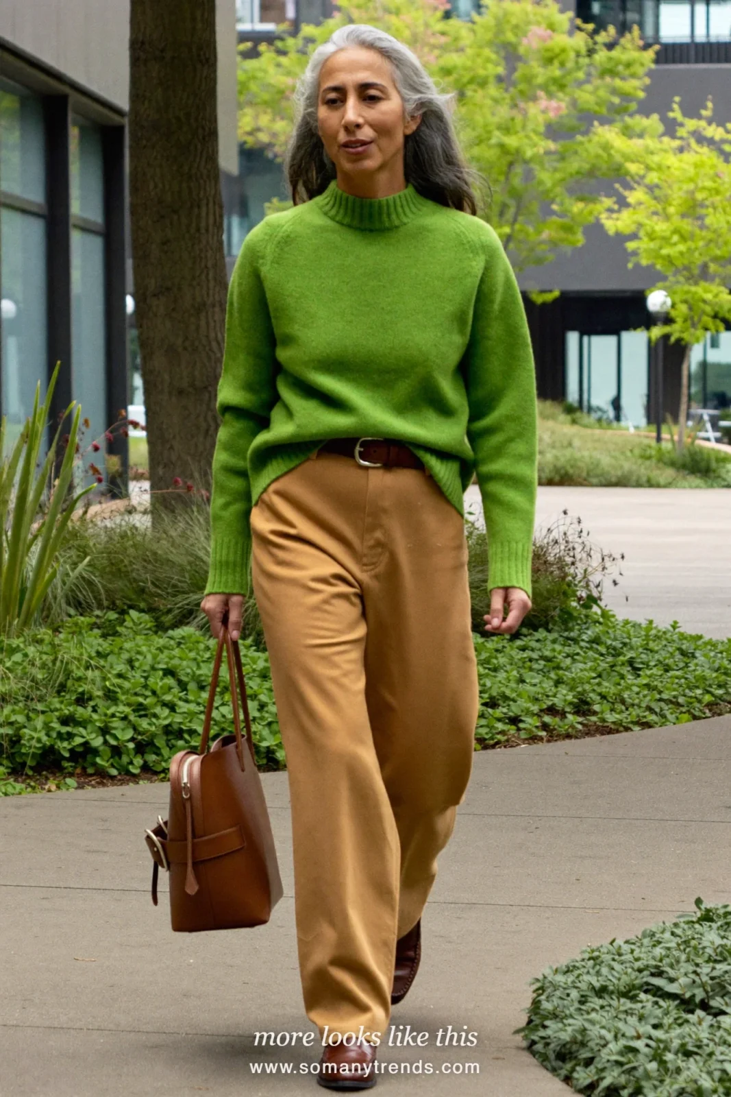 Look 18: pine green merino crew sweater, straight camel pants, brown belt and brown loafers