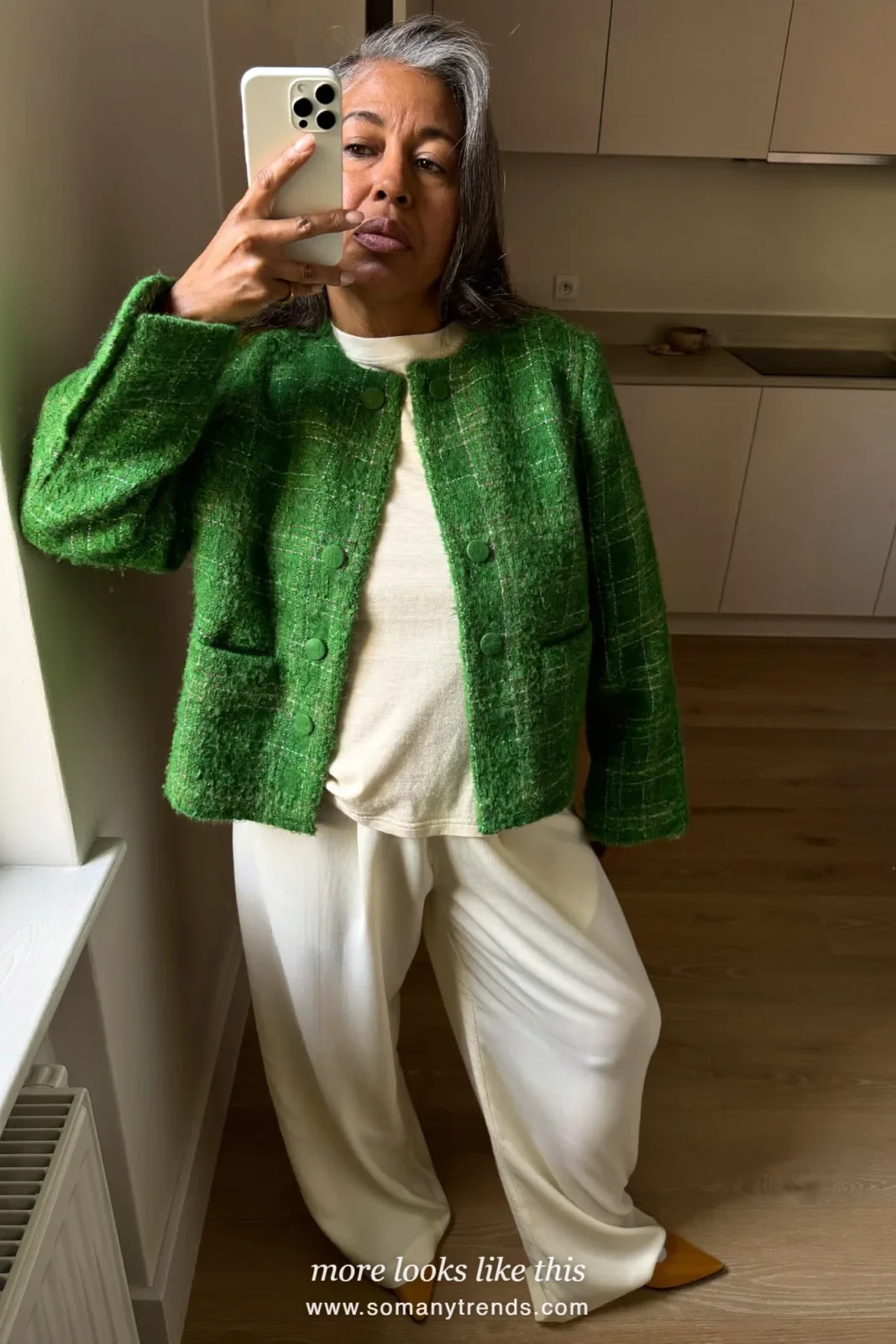 Look 28: pine green tweed boxy jacket, cream tee, ivory wide-leg pants and tan pointed flats