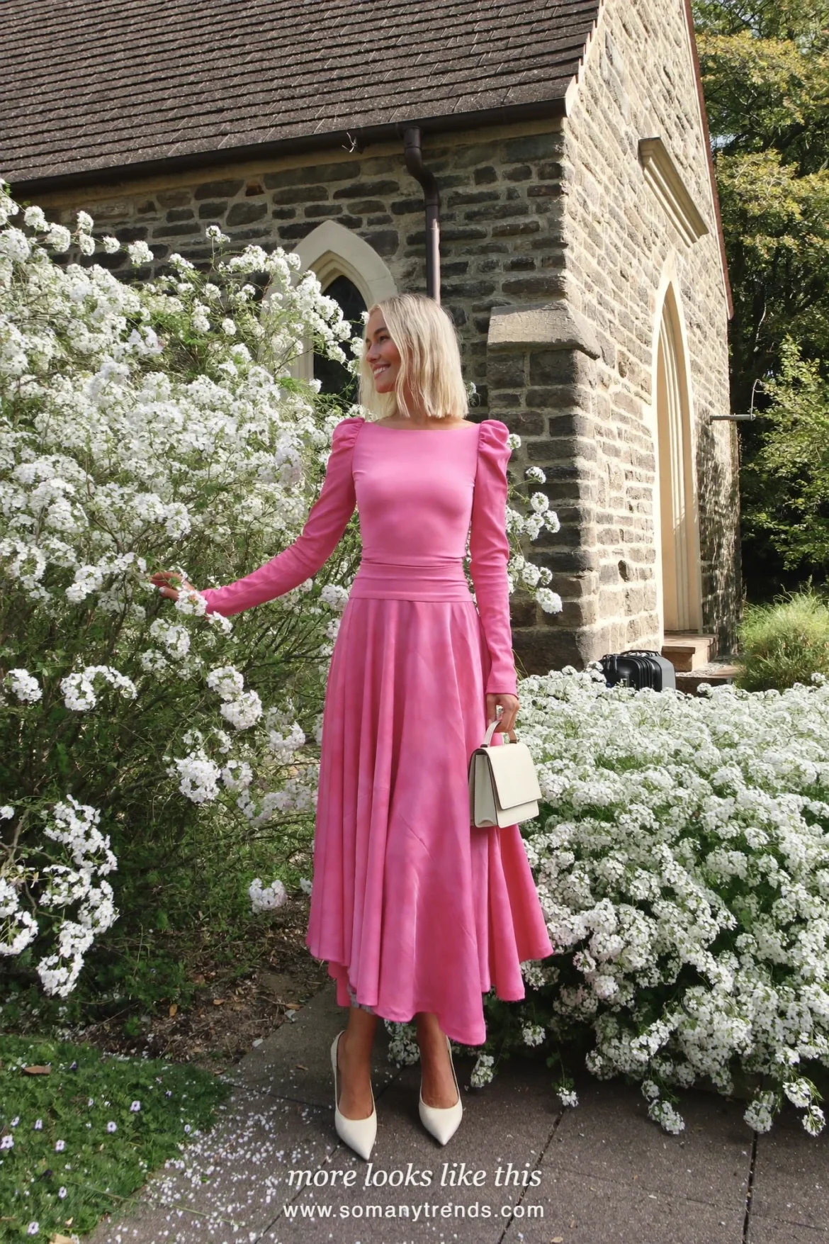 Woman in a candy pink long-sleeve midi dress with a defined waist and cream pumps, Easter church outfit 19
