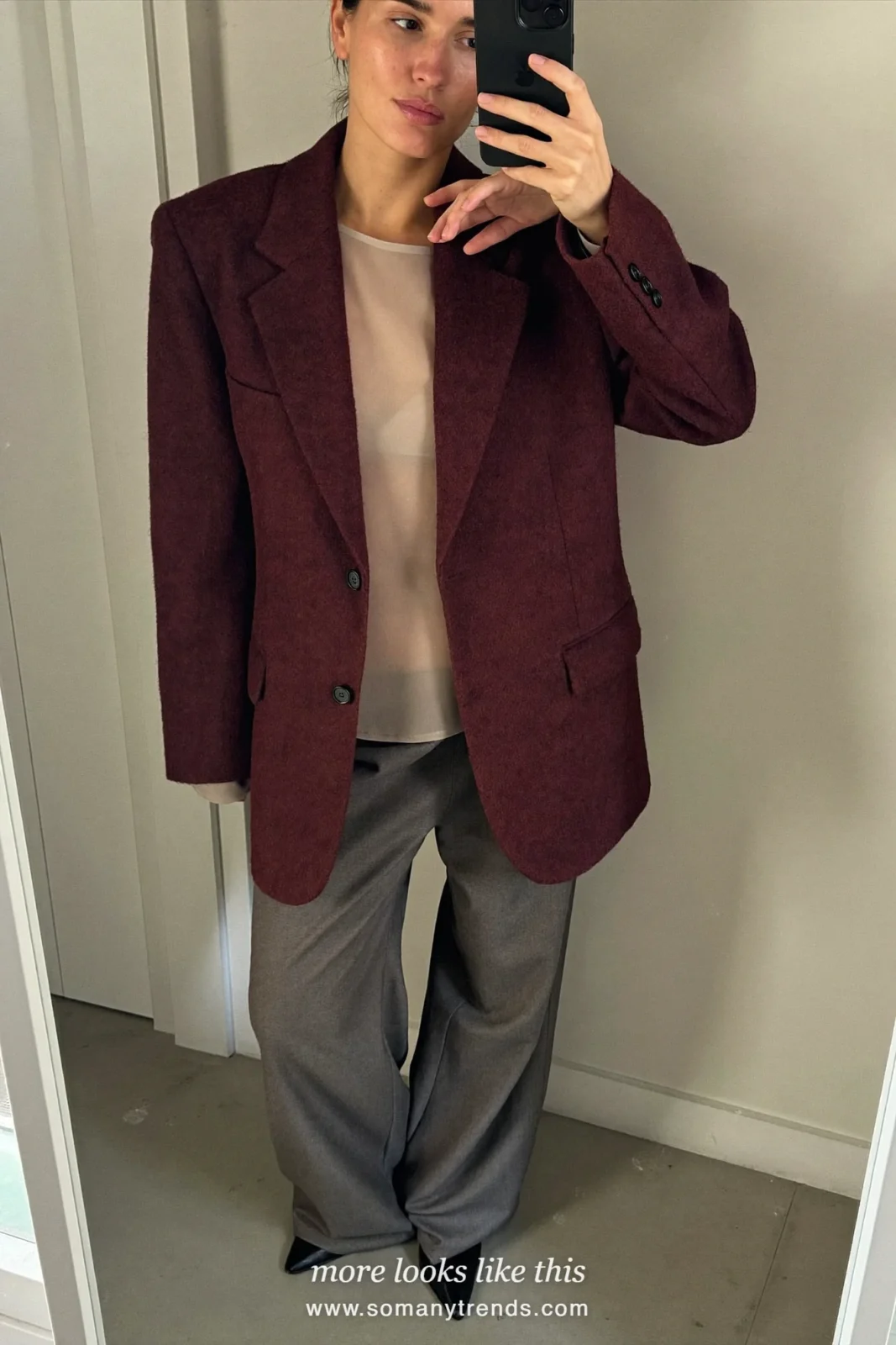 Woman in a burgundy relaxed blazer, gray silk-look shell top, gray straight pants and black square-toe pumps, outfit 4 mirror selfie