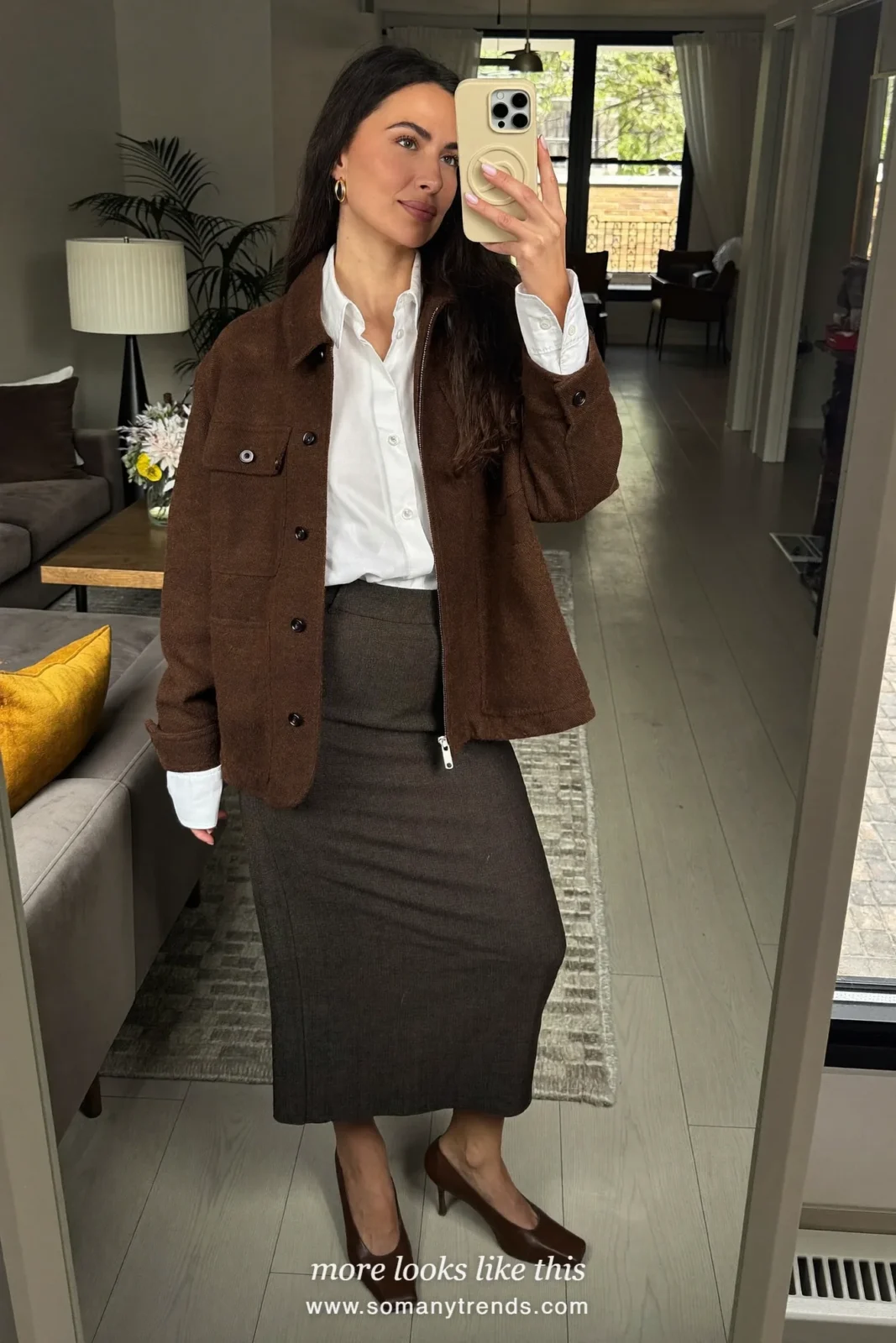 Woman in a boxy brown jacket, chocolate midi pencil skirt, white shirt and brown square-toe pumps, outfit 16 mirror selfie