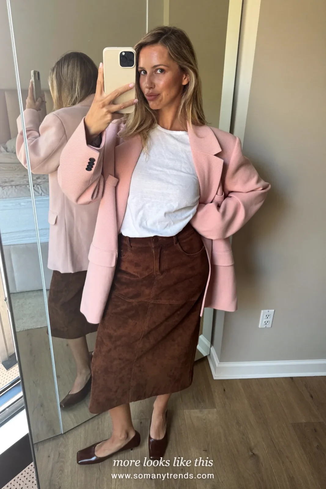 Woman in a dusty pink long blazer, white tee, chocolate midi skirt and brown square-toe pumps, outfit 24 mirror selfie