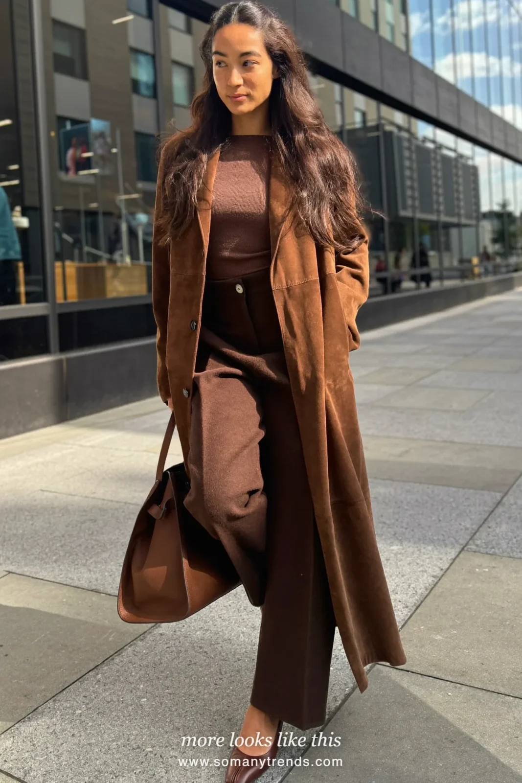 Woman in a chocolate suede-feel jacket, brown fine knit, chocolate wide-leg pants and brown square-toe pumps, outfit 33