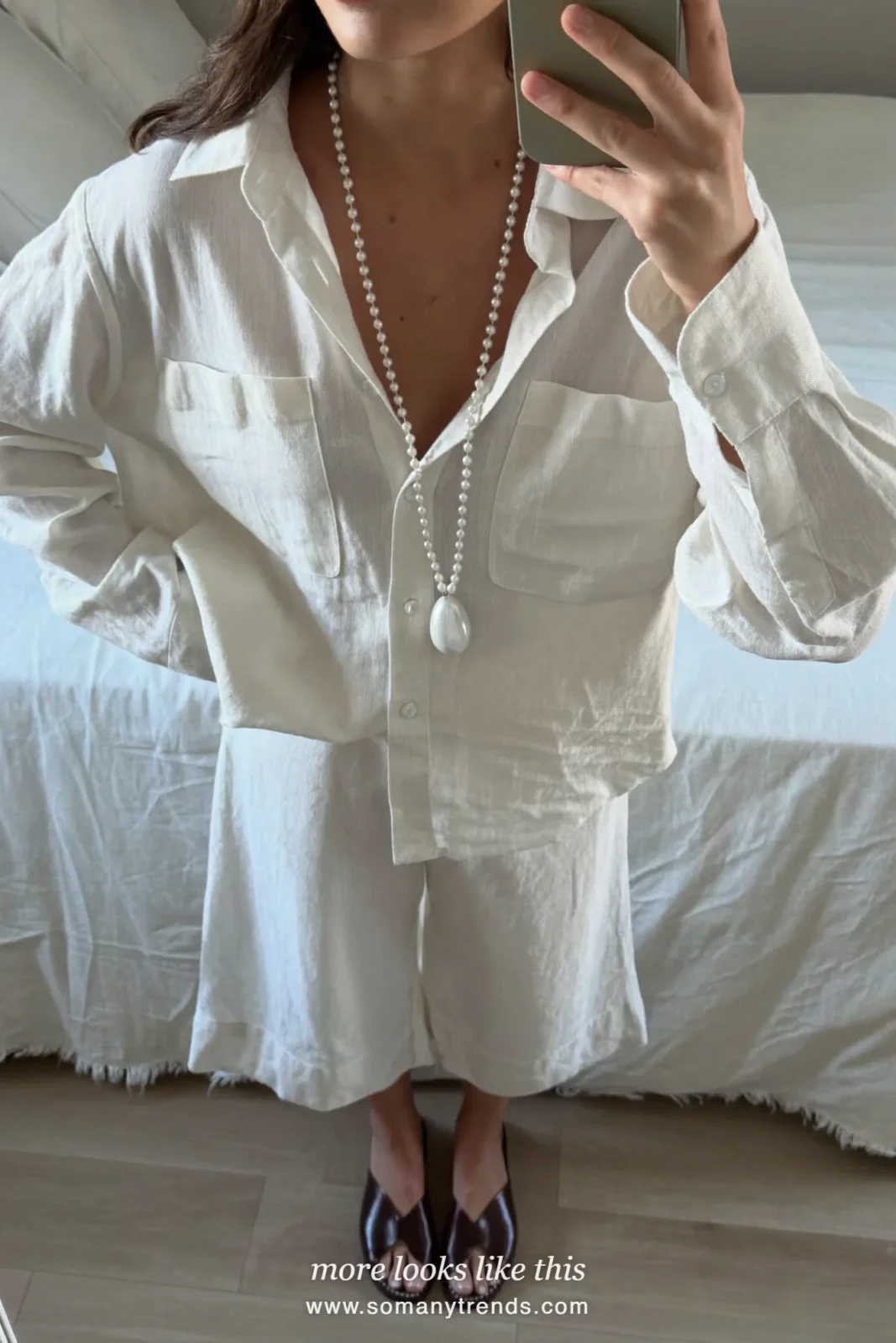 Look 8: ivory linen shirt and wide pants with a pearl pendant, mirror selfie at home in the bedroom