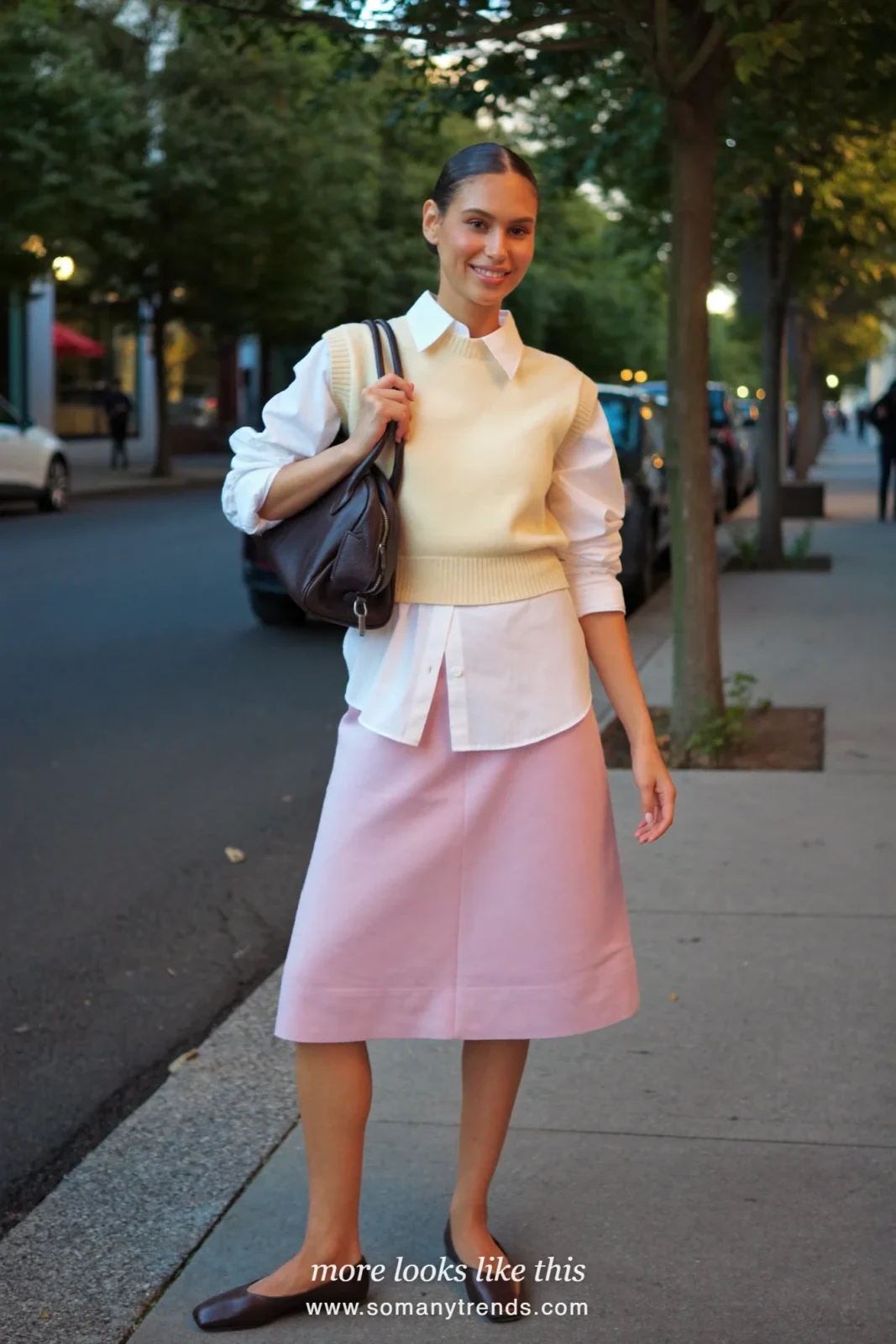 Look 11: cream knit vest over white poplin shirt with pale pink midi skirt and espresso flats