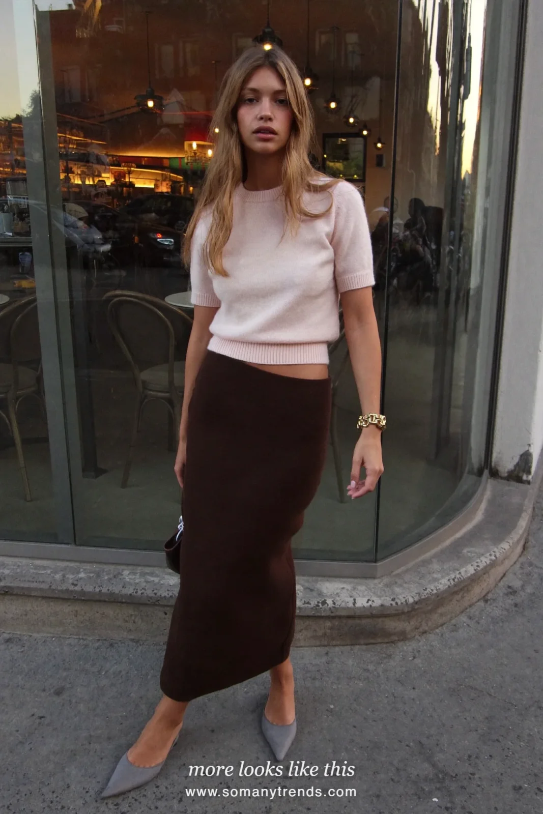 Look 26: pale pink fine knit with double-layer espresso midi skirt and wide bracelet