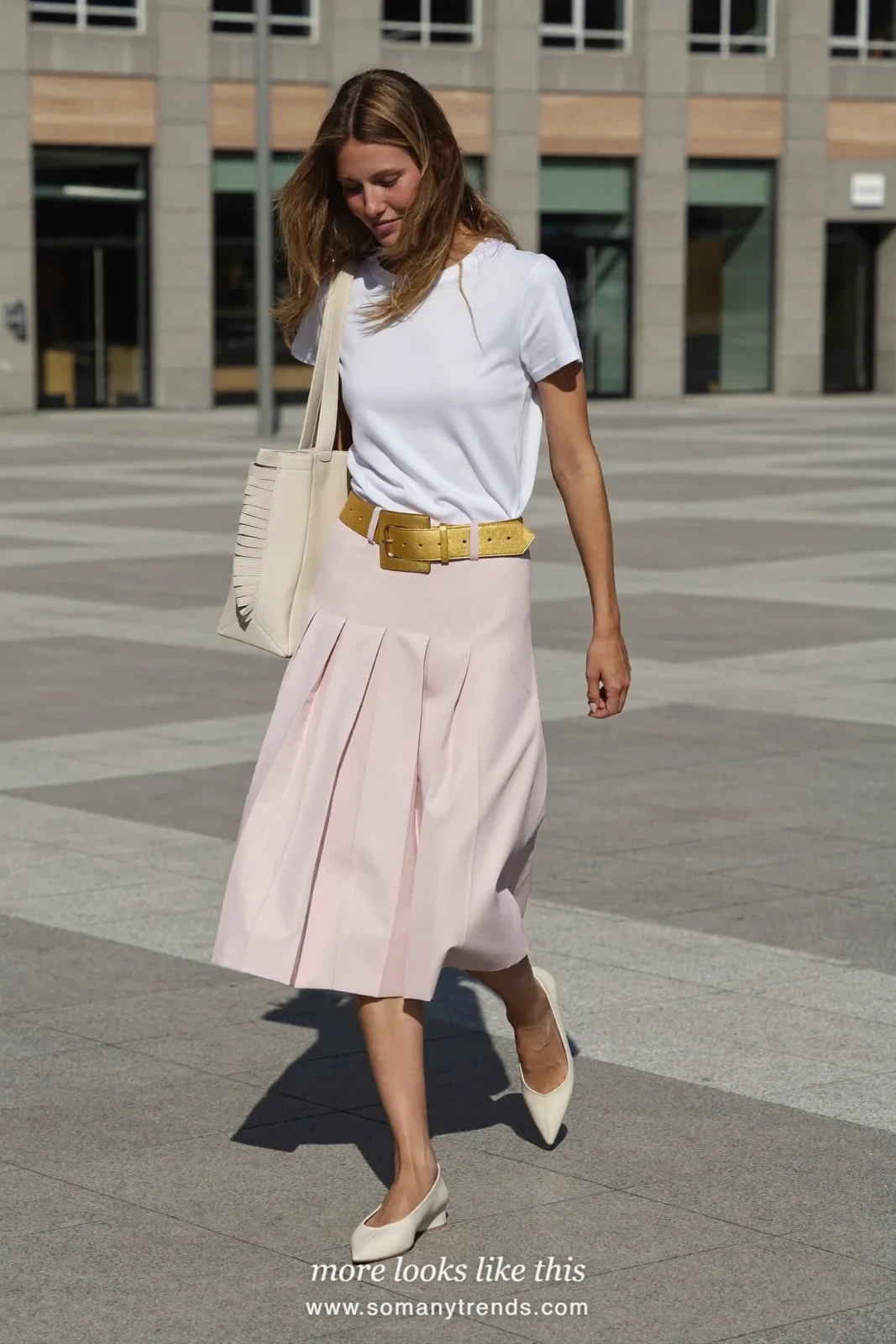 Look 7: pale pink pleated midi skirt with white tee, gold belt and pointed flats