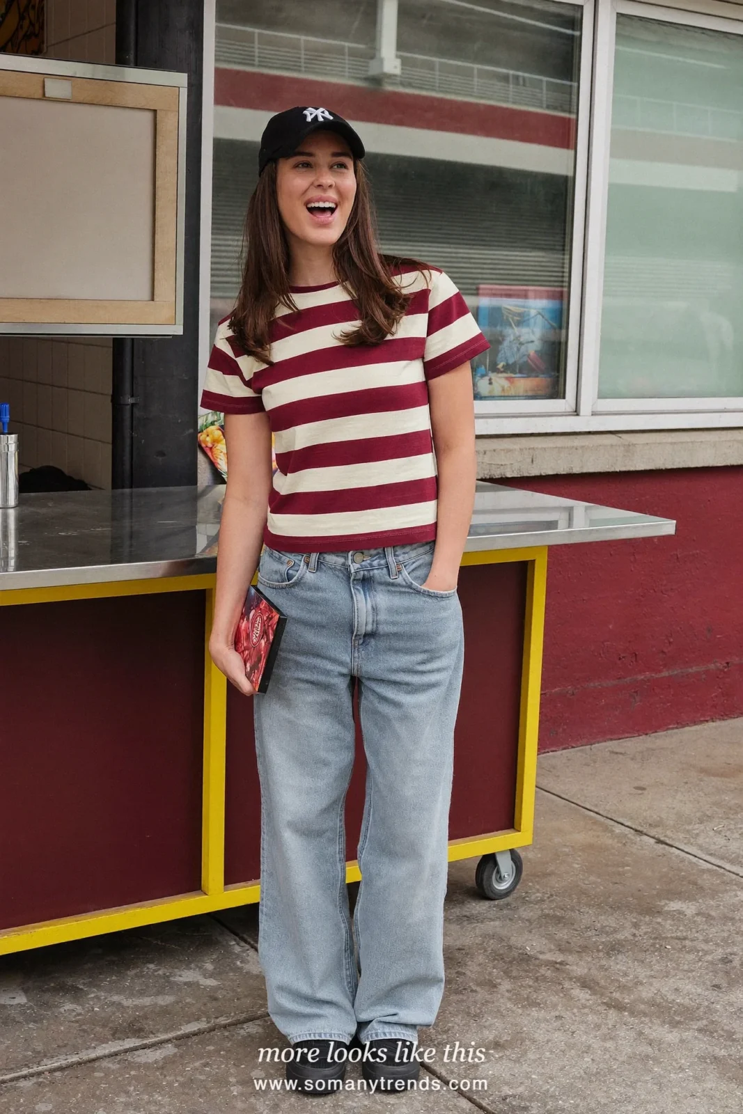 Wine and cream striped baseball tee with light wash barrel jeans, black cap and sneakers, outfit 6