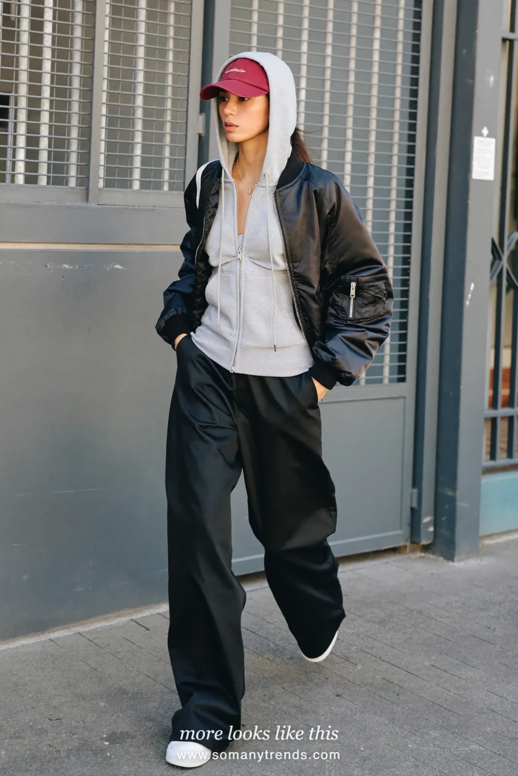 Gray hoodie under black bomber with wide black pants, wine cap and white sneakers, outfit 18