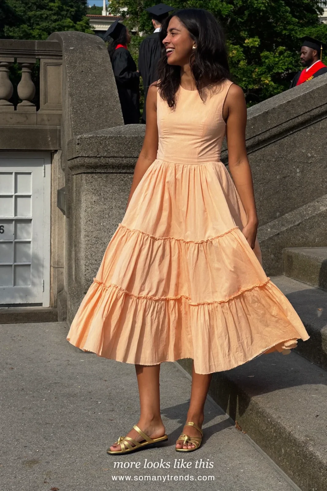 Peach midi dress with a ruffled hem and gold flat sandals, graduation outfit 13