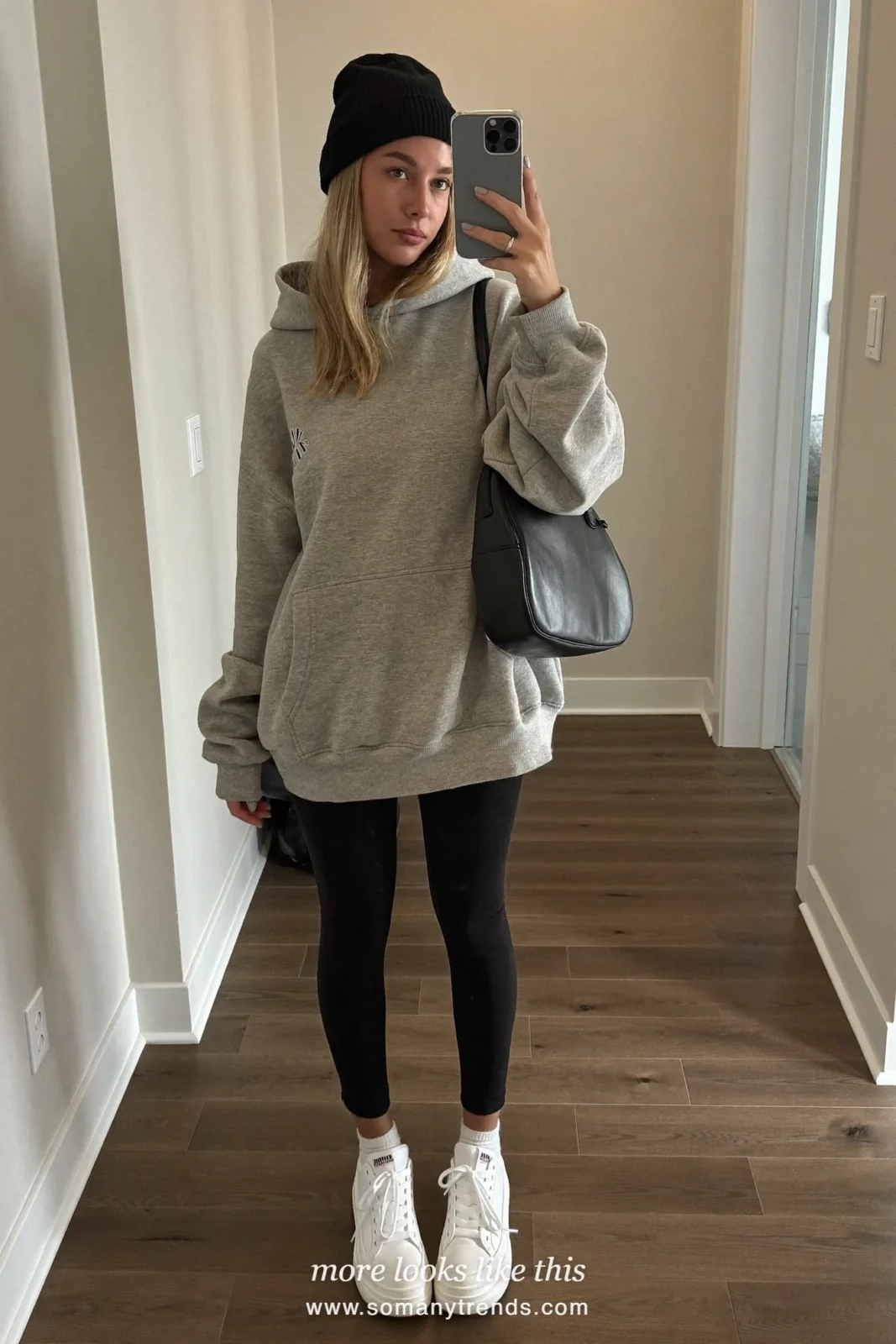 Oversized gray hoodie, black leggings, white socks, white sneakers, black beanie and small black bag, outfit 4