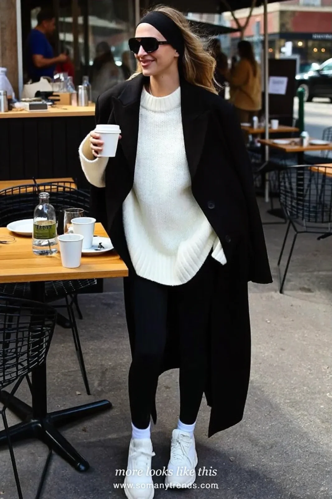 Long black coat, white oversized sweater, black leggings, white socks, white chunky sneakers, headband and sunglasses, outfit 5