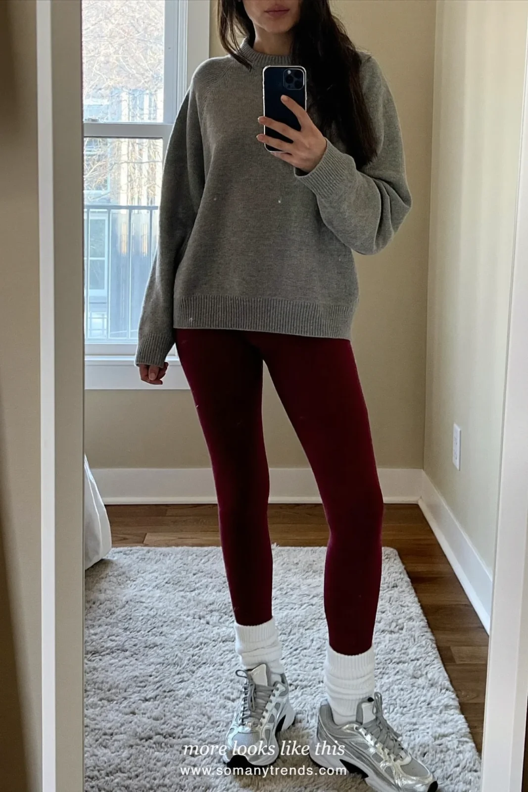 Long burgundy coat, gray sweater, burgundy leggings, white socks and silver sneakers, outfit 8