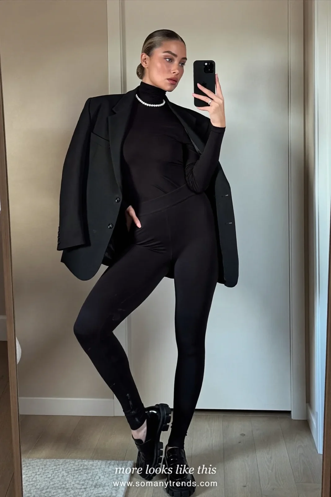 Oversized black blazer, black turtleneck, black leggings, black loafers and pearl necklace, outfit 14