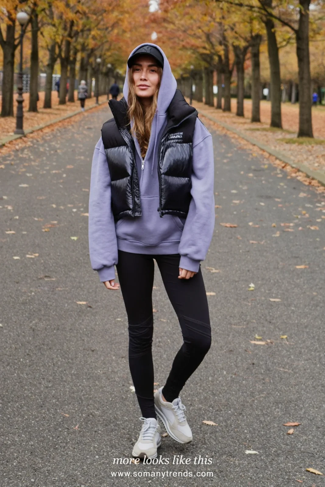 Lavender hoodie, black puffer vest, black leggings, gray sneakers and cap, outfit 17