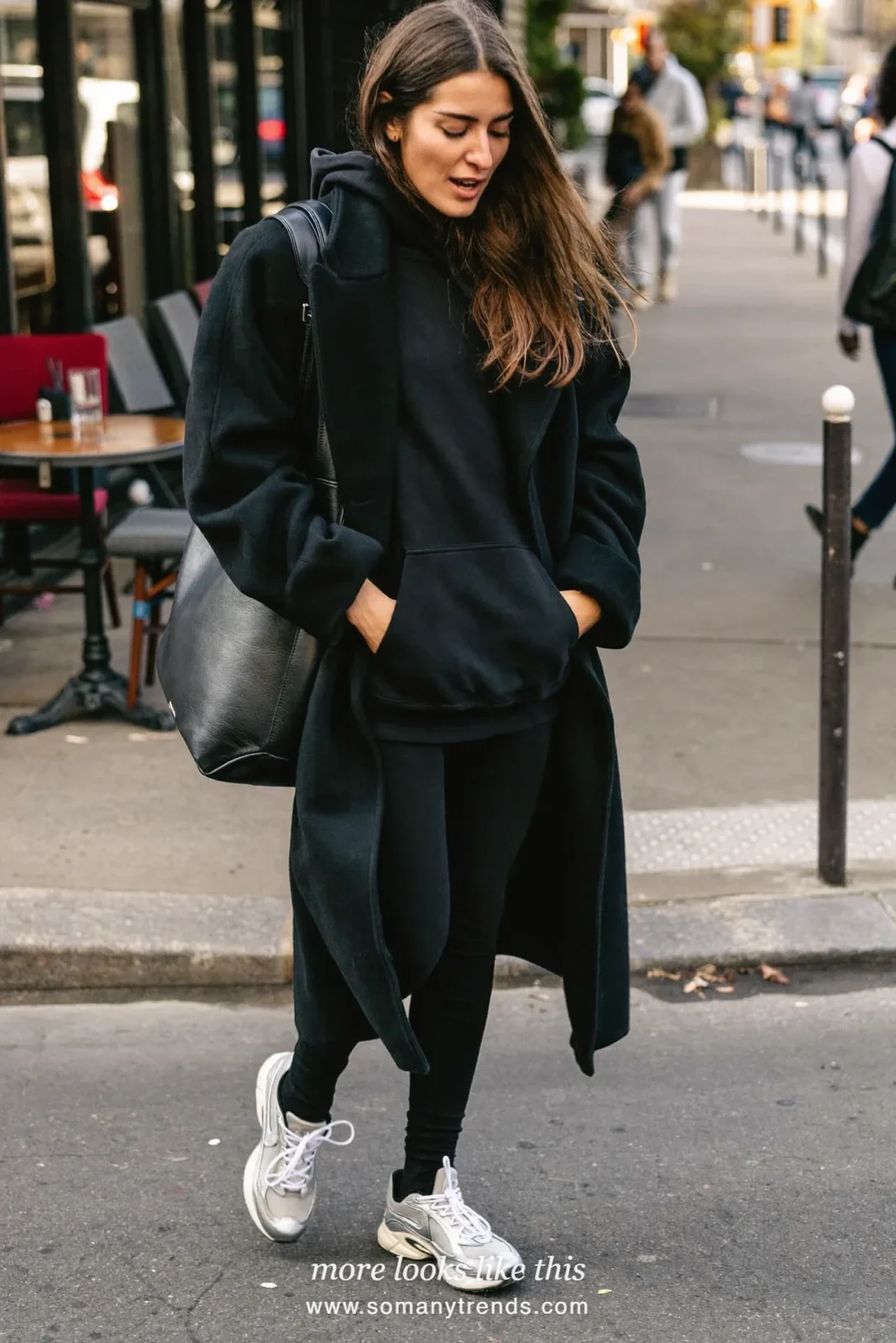 Black hoodie, long black coat, black leggings, silver sneakers and black leather bag, outfit 19