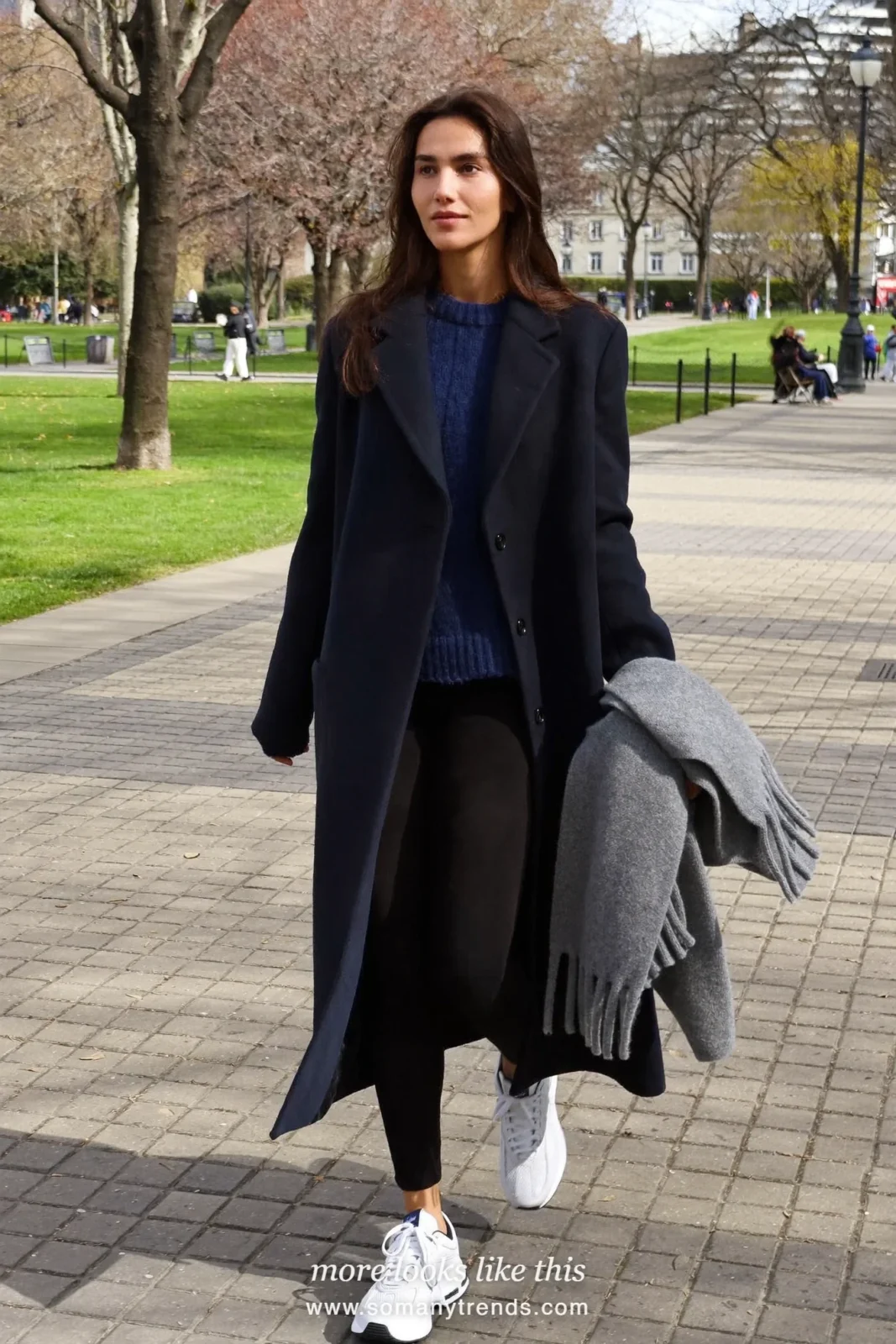 Long navy coat, navy sweater, black leggings, lavender beanie and white sneakers, outfit 21