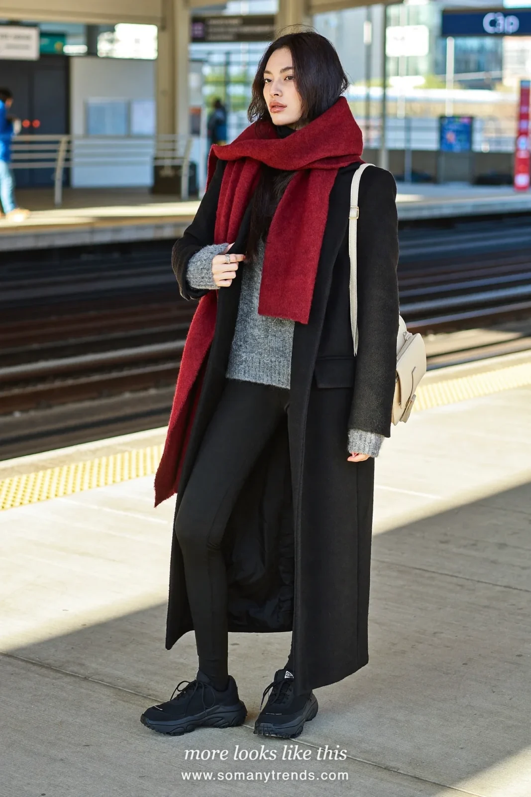 Long black coat, burgundy scarf, gray sweater, black leggings and black sneakers, outfit 25