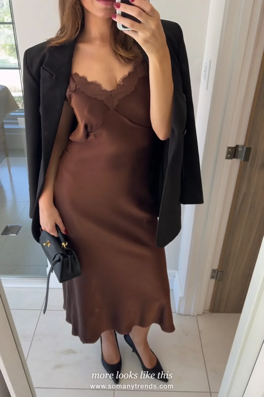 Woman in a chocolate brown lace-trim slip dress, black blazer and pointed pumps, cocktail outfit 28