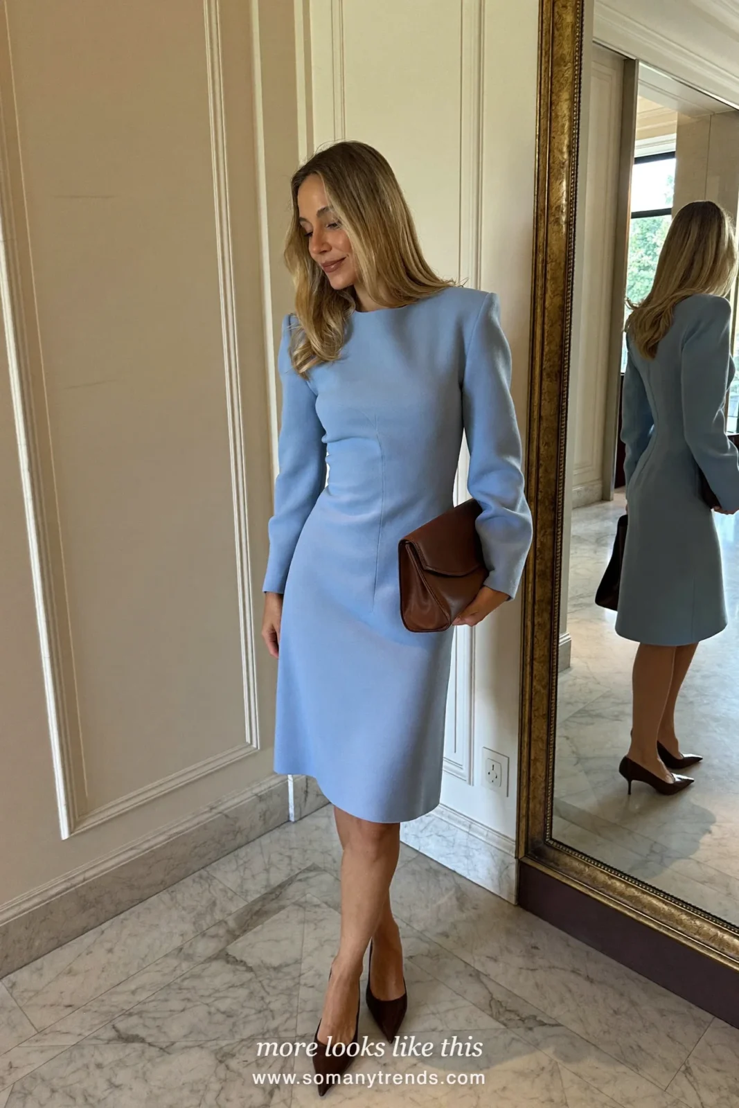 Woman in a powder blue wool crepe midi dress, chocolate brown pumps and a brown clutch, cocktail outfit 13