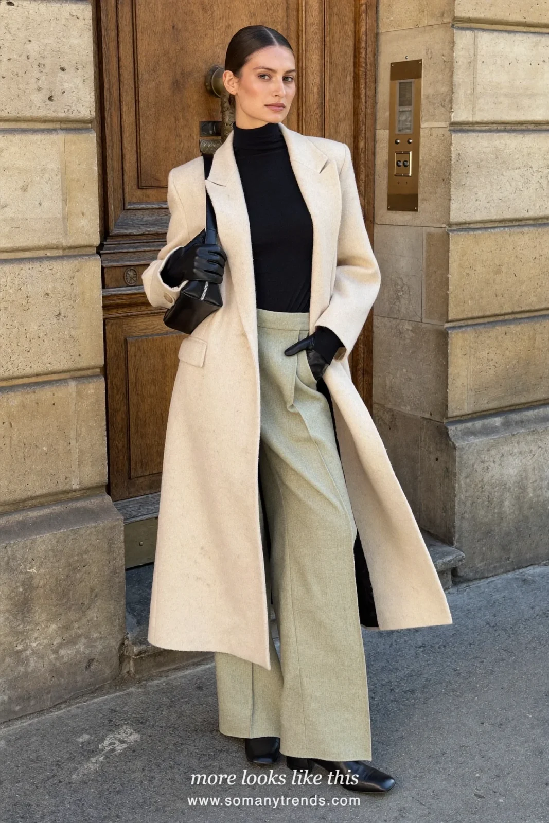 Ecru wool coat with black leather gloves, black turtleneck, sage wide-leg pants and black ankle boots, outfit 2