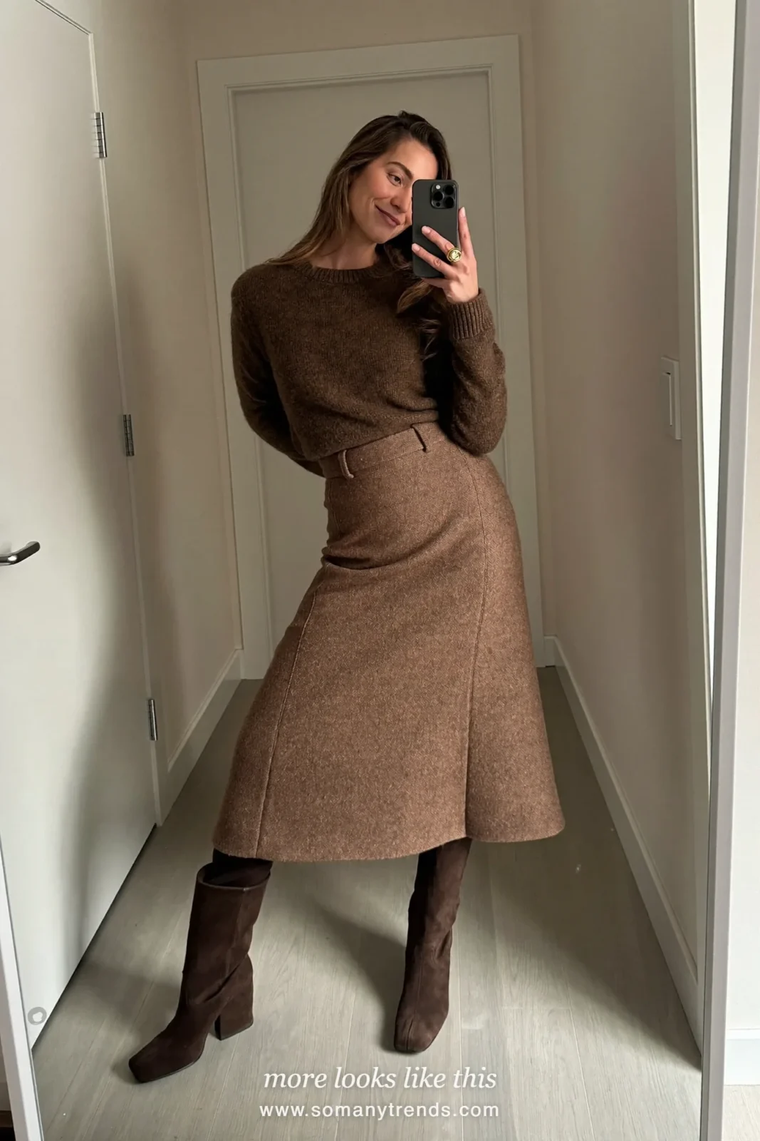 Espresso brown knit sweater, espresso midi skirt, brown suede knee-high boots, mirror selfie in a hallway, outfit 4