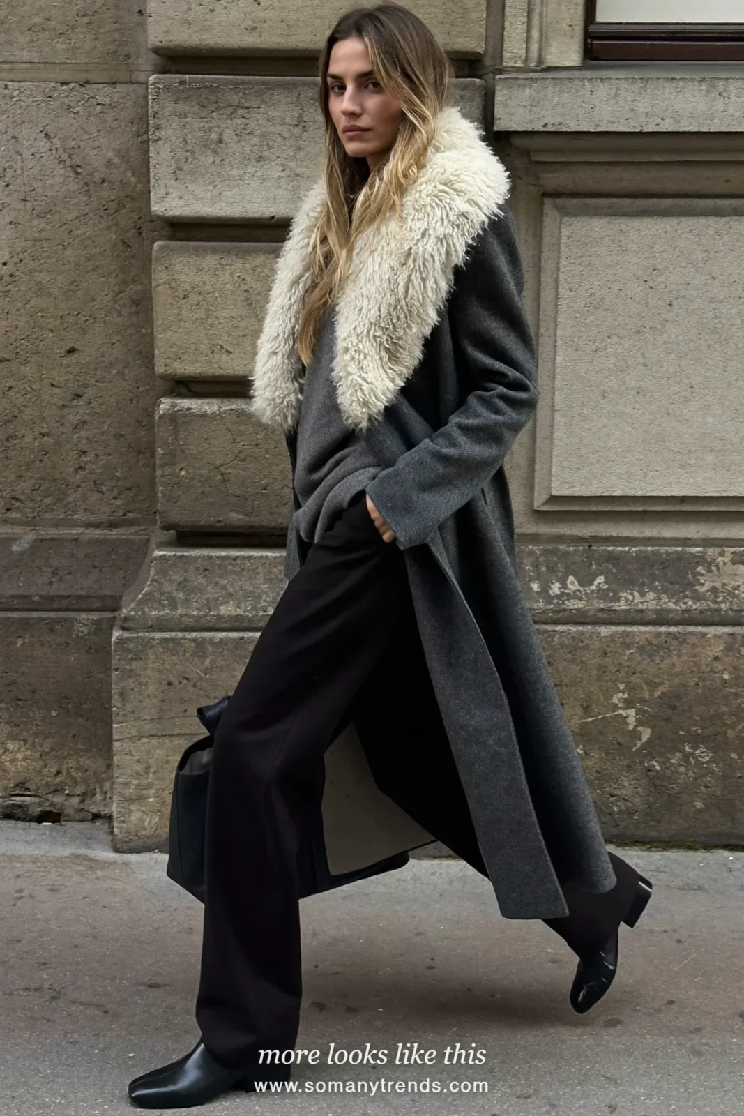 Charcoal wool coat with a cream faux-fur collar, gray knit, black pants and black boots, outfit 17