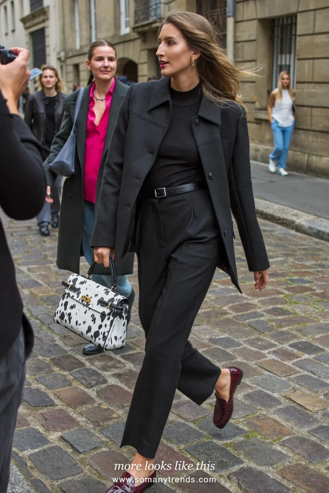 Black belted jacket, black straight pants, Dalmatian-print bag and burgundy croc loafers, outfit 19