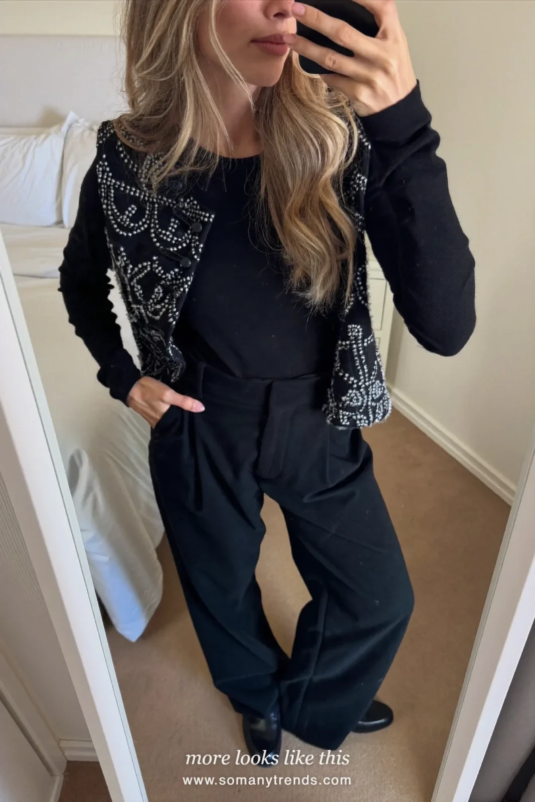 Black embroidered jacket with frog fastenings, black knit, wide black pants and black loafers, outfit 20