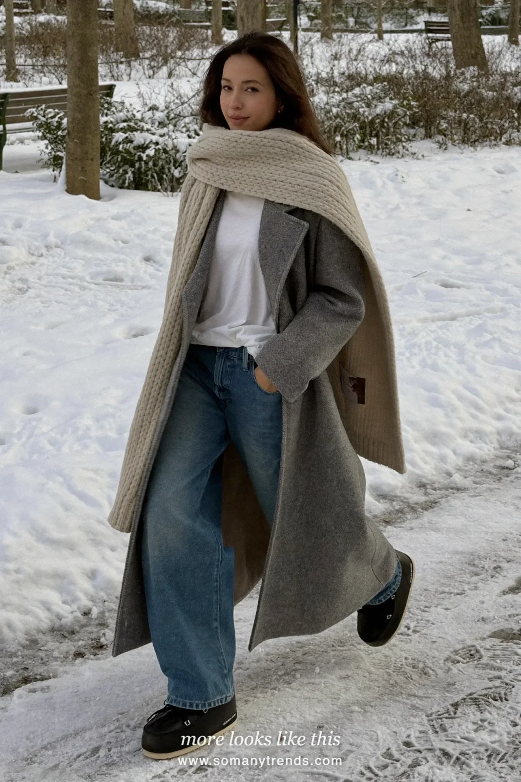 Oversized long gray wool coat with white tee, blue jeans, oatmeal scarf and snow boots in a snowy park, outfit 15