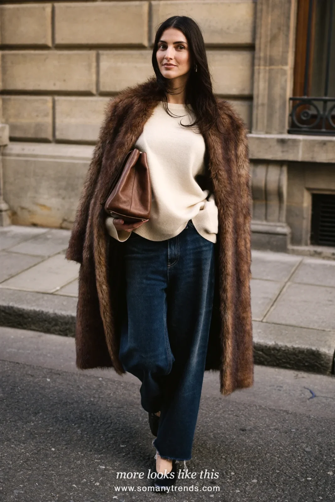 Long brown faux fur coat over a cream sweater, dark straight jeans, black ballet flats and a leather shoulder bag, outfit 7