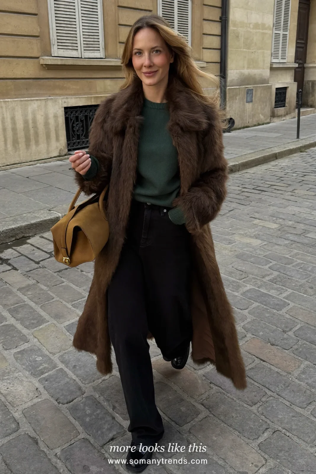 Long brown faux fur coat over a forest green sweater, black wide pants and black loafers, outfit 18