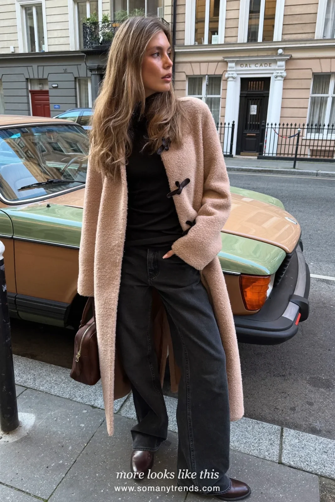 Beige toggle teddy coat over black turtleneck, dark straight jeans and brown ankle boots, outfit 5