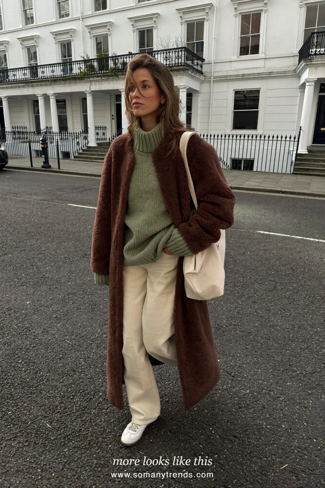 Brown teddy coat over sage green sweater, cream pants and white sneakers, outfit 17